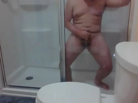 Chubby asian cums in hotel shower